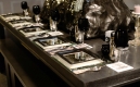 7.-day-5-finish-details_set-table-with-mirror-chargers,-black-plates-and-black-wine-glasses,-swarovski-covered-center-piece-