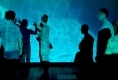 viewer-fits-her-hand-over-silouette's-hand
